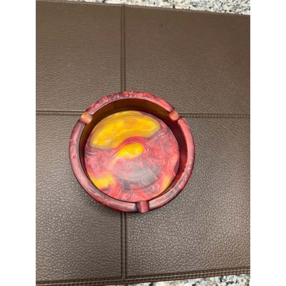 Ashtray new never used. Burgundy and yellow.